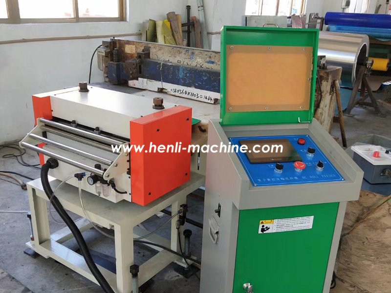Alimentador servo NC HENLI para medir y avanzar material antes del corte